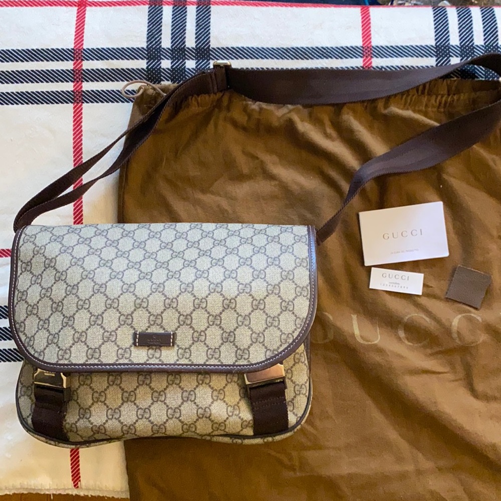 I have an Authentic Gucci supreme canvas messenger bag unisex